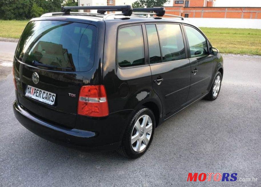 2004' Volkswagen Touran 2,0 Tdi photo #2