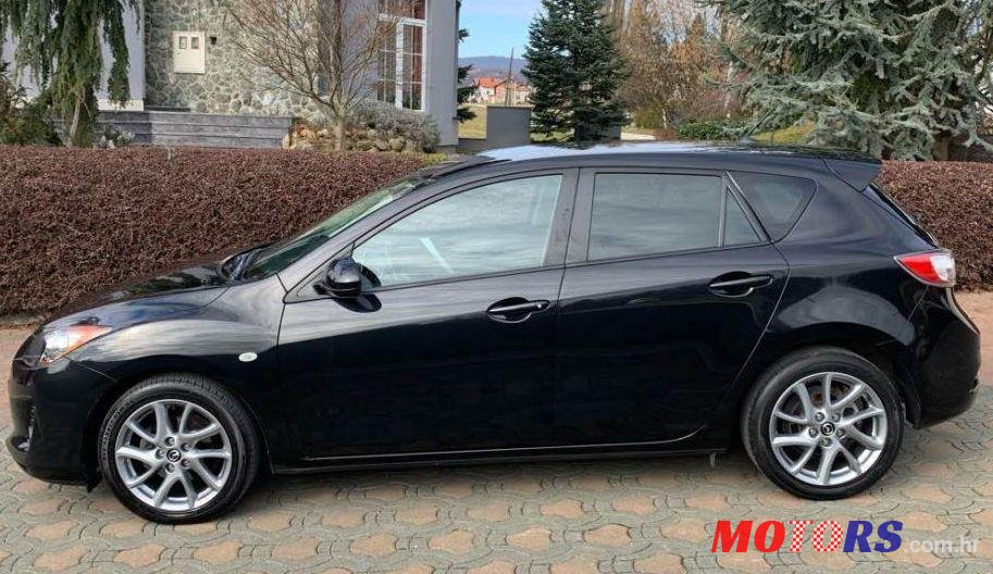 2013' Mazda 3 Sport photo #1