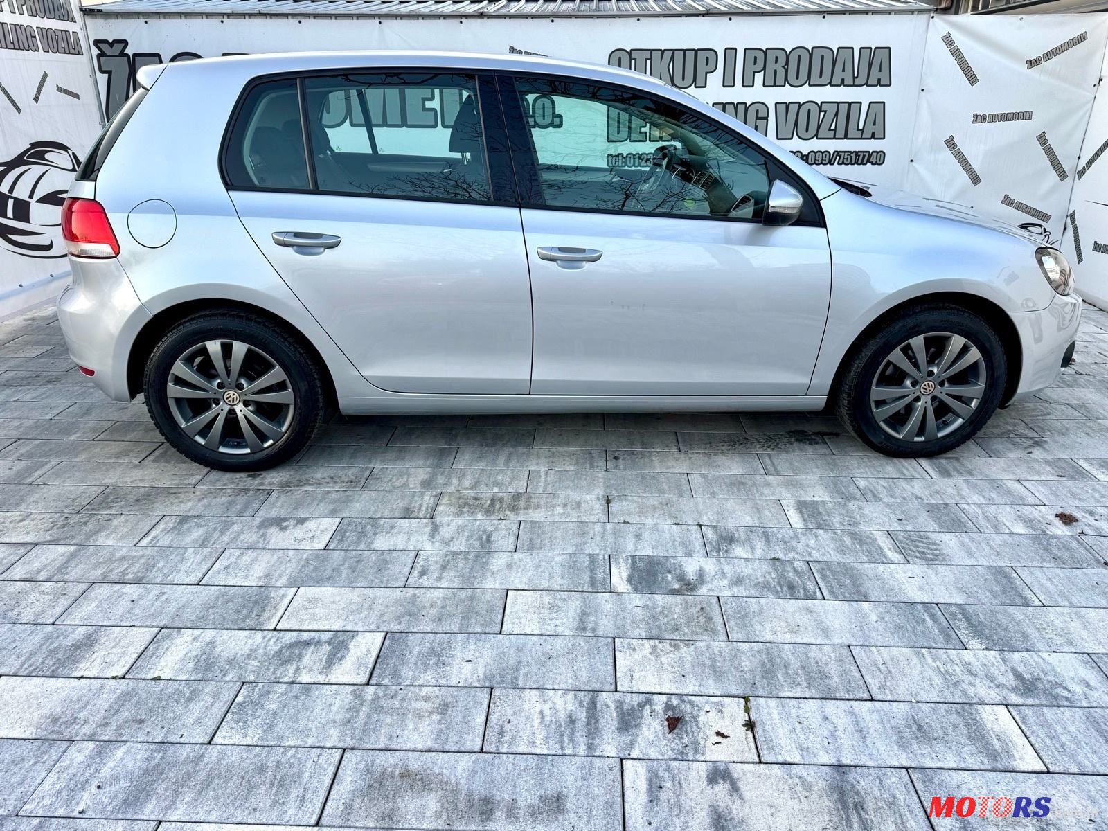 2012' Volkswagen Golf VI 1,6 Tdi photo #2