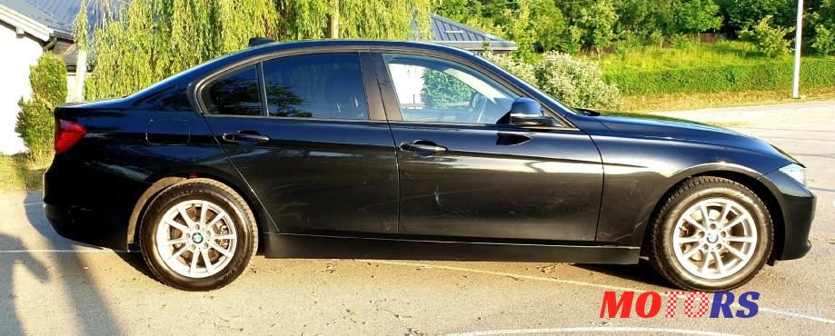 2013' BMW Serija 3 318D photo #6