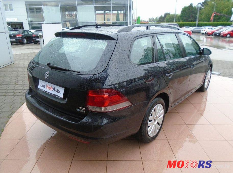 2011' Volkswagen Golf VI Variant photo #1