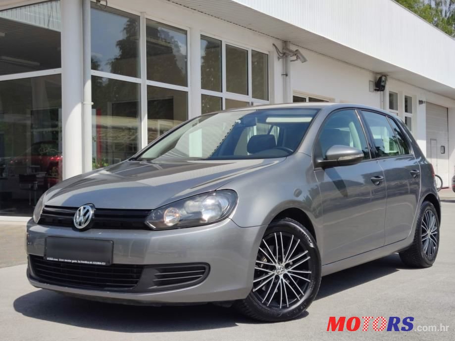 2011' Volkswagen Golf VI 1,6 Tdi photo #1