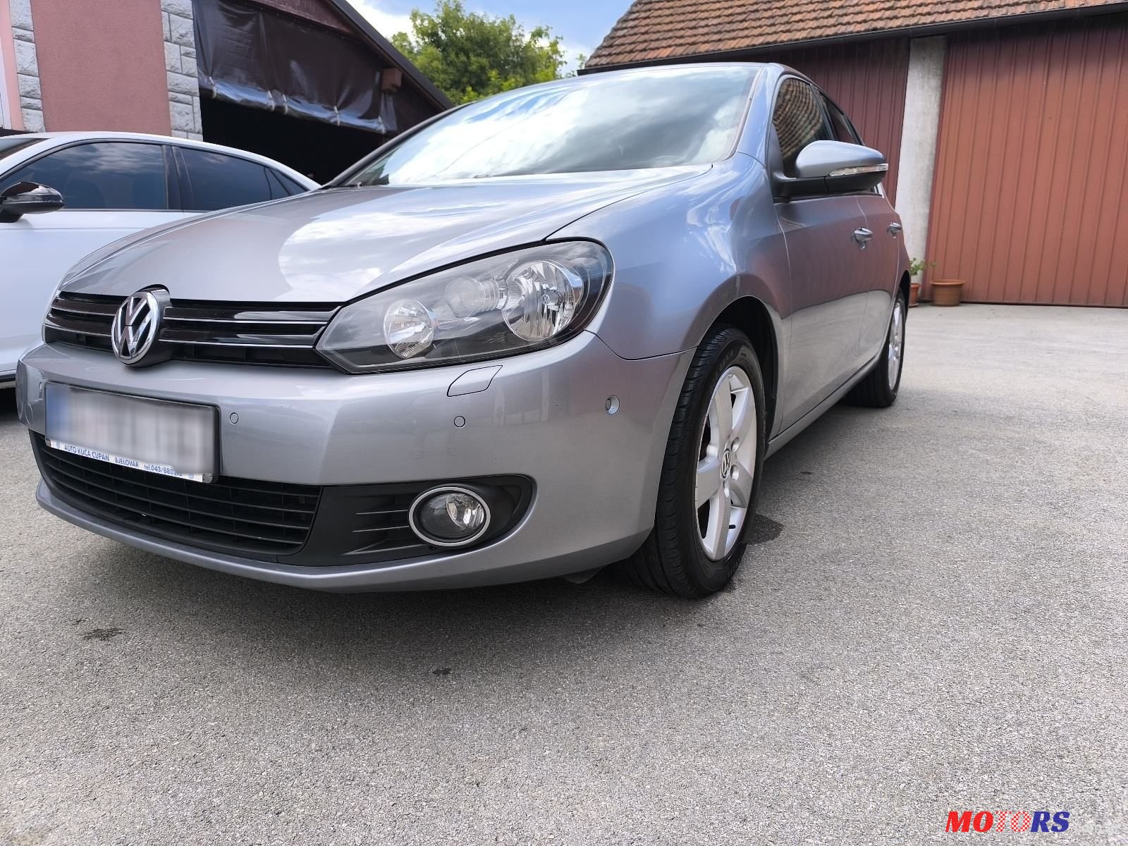 2010' Volkswagen Golf VI 1,6 Tdi photo #3