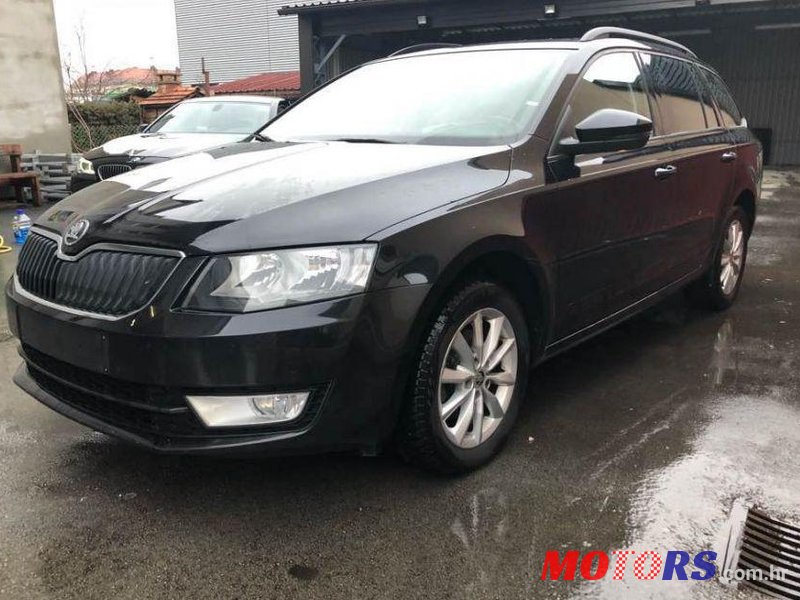 2013' Skoda Octavia Combi 1,6 Tdi photo #1