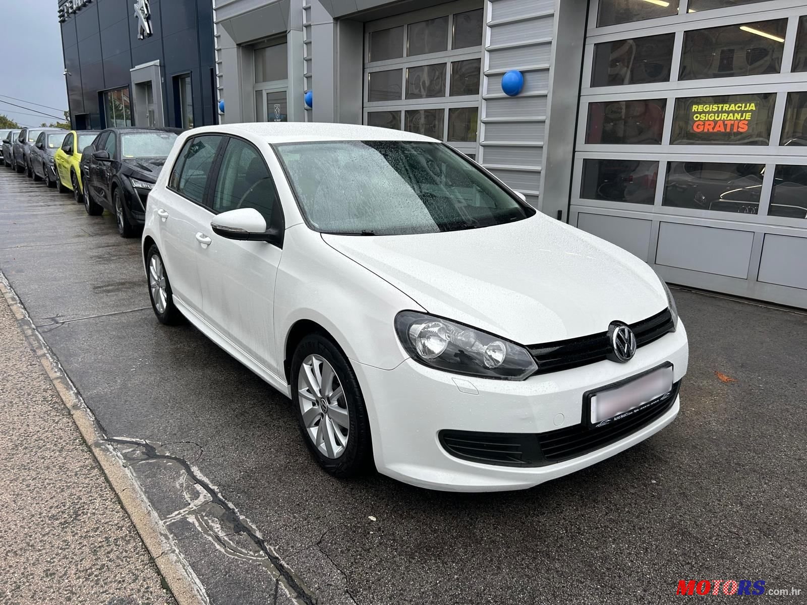 2011' Volkswagen Golf VI 1,6 Tdi photo #2