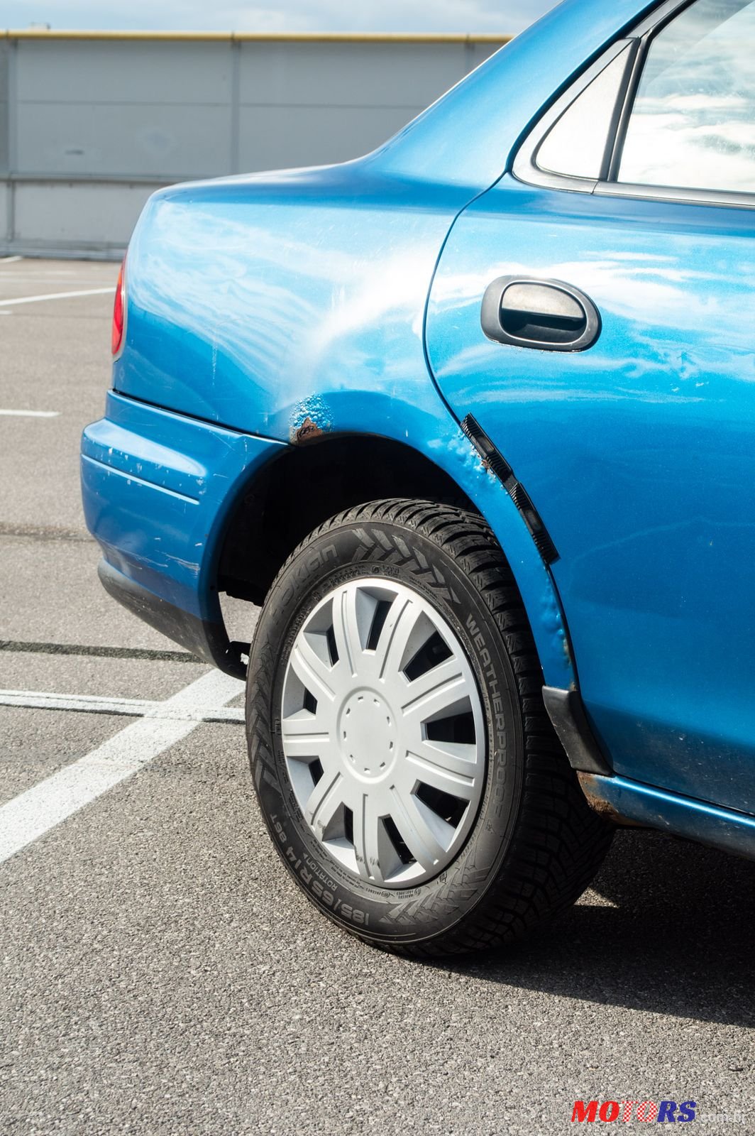 1997' Mazda 323 photo #5