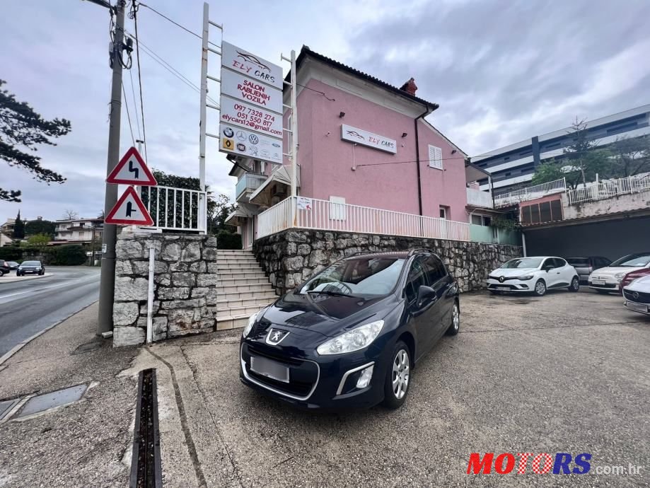 2012' Peugeot 308 photo #1