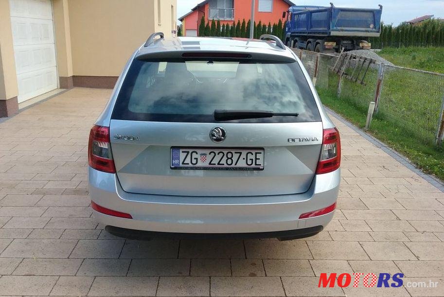 2013' Skoda Octavia Combi 1,6 Tdi photo #1