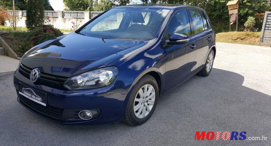 2011' Volkswagen Golf VI 1,6 Tdi photo #2