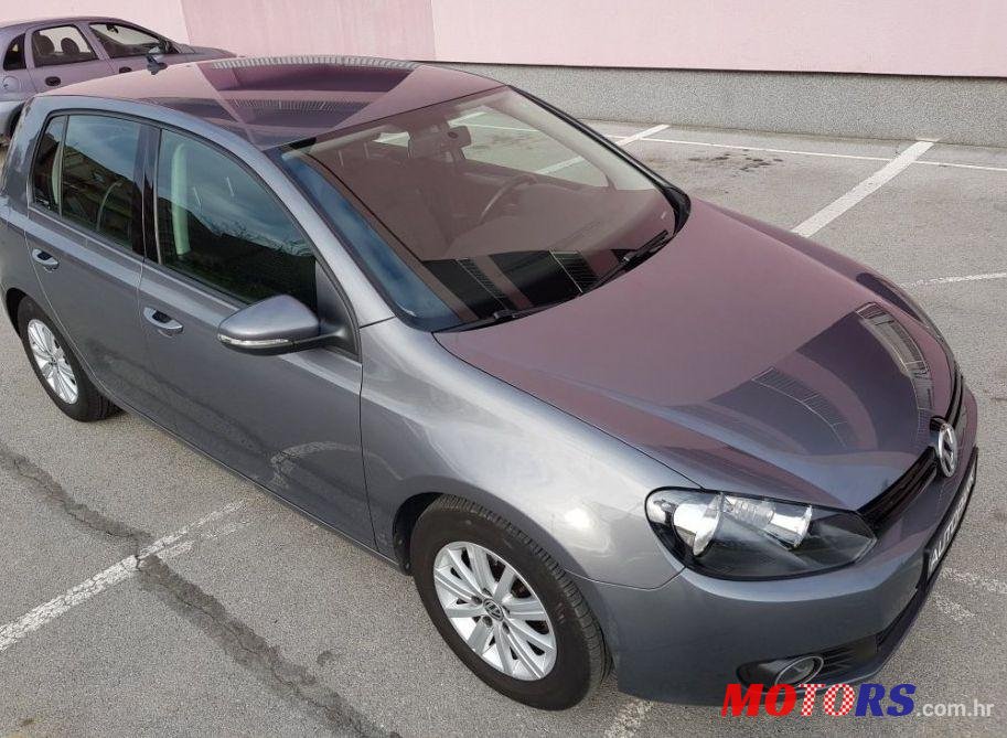 2012' Volkswagen Golf VI 1,6 Tdi photo #1