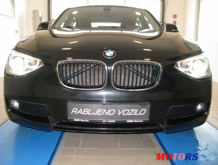 2012' BMW 1 Series 116D photo #1
