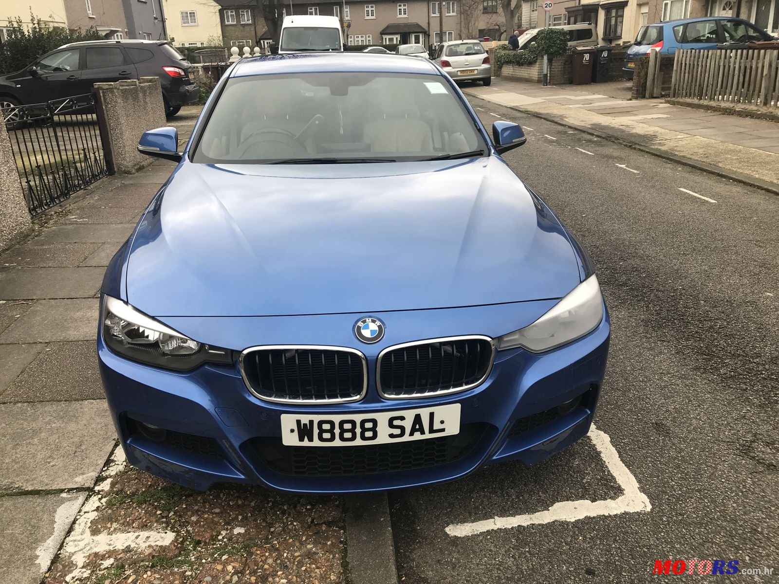 2012' BMW 3 Series M Sport with M3 wings photo #3