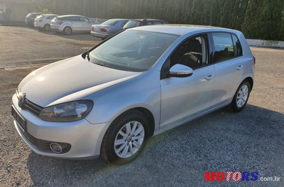 2011' Volkswagen Golf VI 1,6 Tdi photo #1