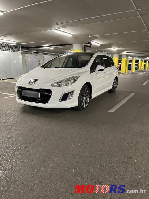 2011' Peugeot 308 Sw photo #2
