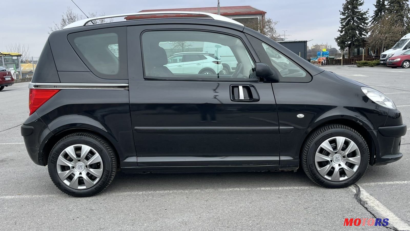 2007' Peugeot 1007 1,4 16V photo #6