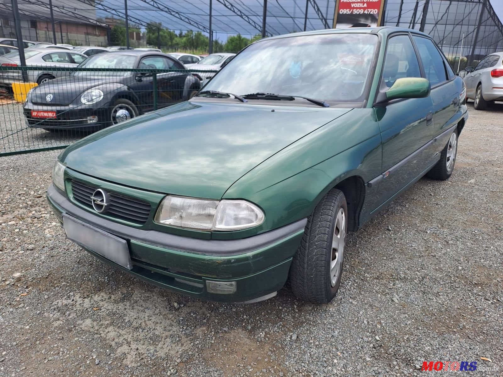 1997' Opel Astra 1.6I photo #1