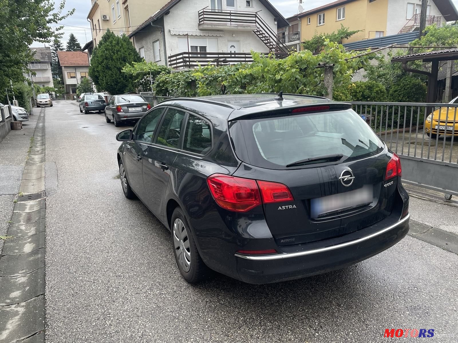 2014' Opel Astra Karavan photo #4