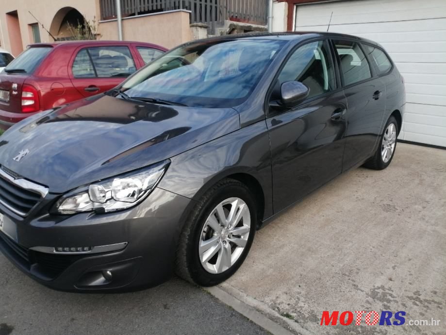 2017' Peugeot 308 Sw photo #1