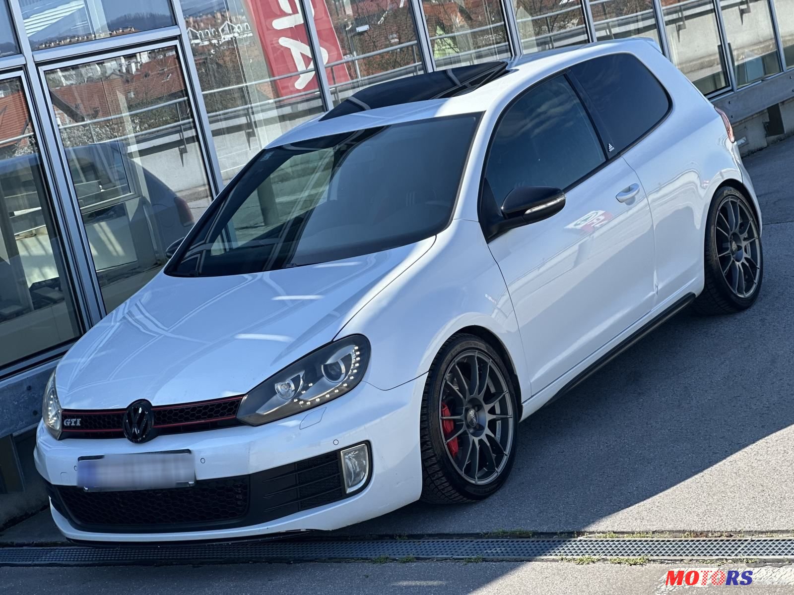2011' Volkswagen Golf VI 2,0 Tsi photo #1