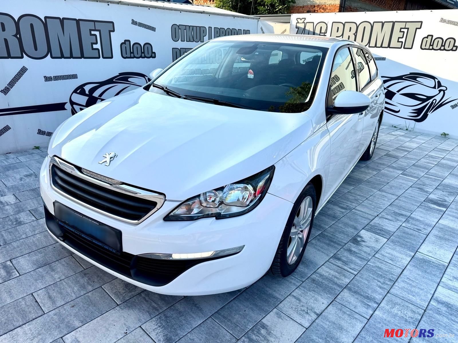 2014' Peugeot 308 Sw photo #1