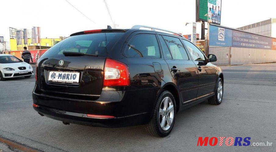 2011' Skoda Octavia Combi 1,6 Tdi photo #2