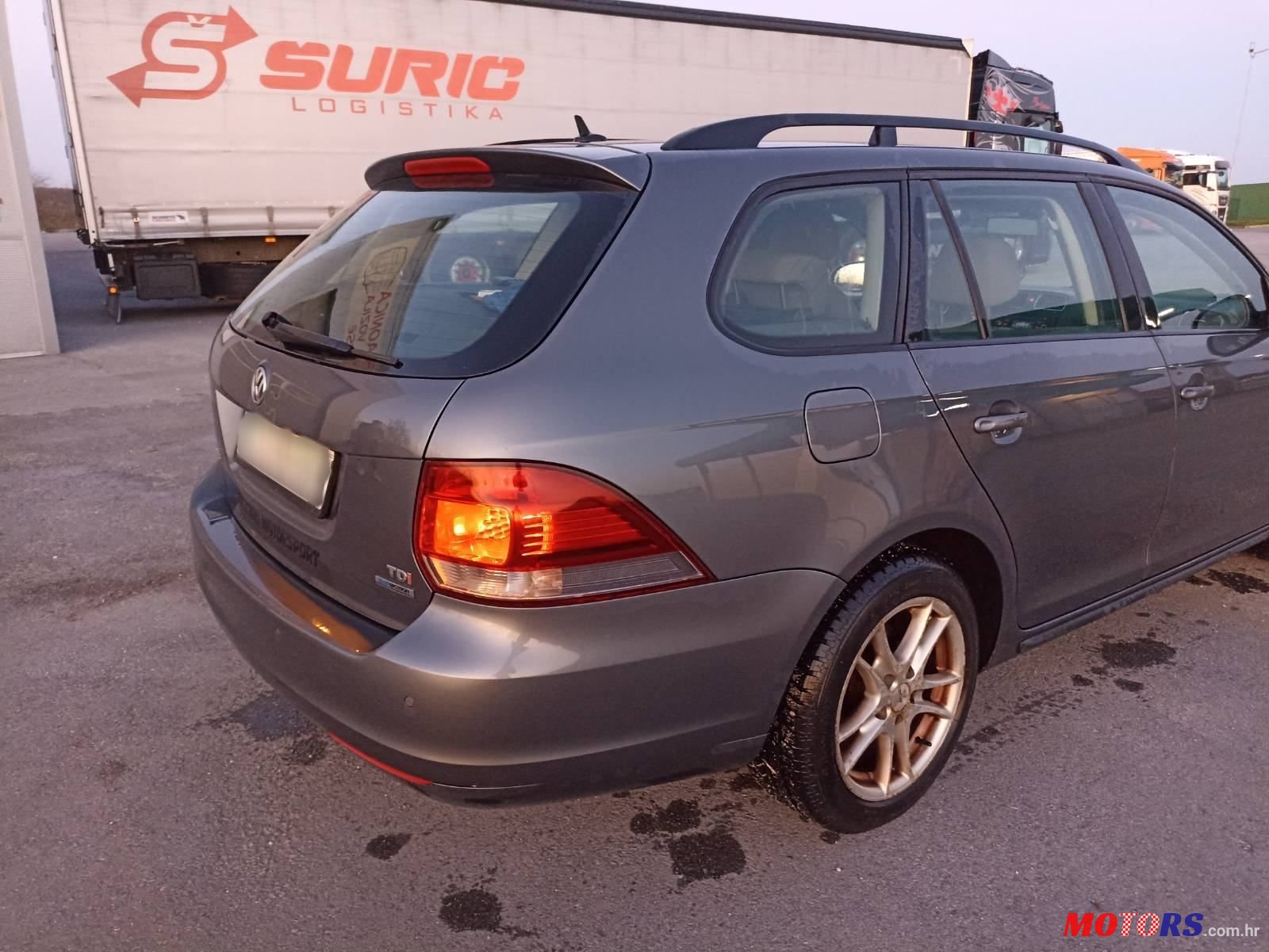 2011' Volkswagen Golf VI Variant photo #2