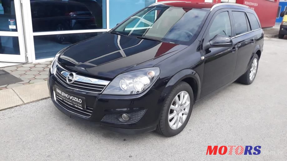 2012' Opel Astra Karavan photo #2