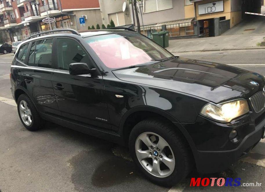 2009' BMW X3 Xdrive20D photo #1