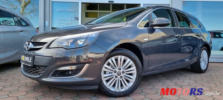 2014' Opel Astra Karavan photo #1