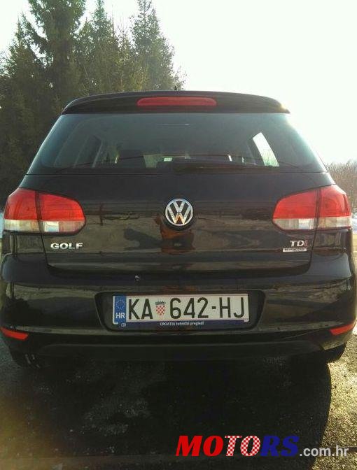 2011' Volkswagen Golf VI 1,6 Tdi photo #1