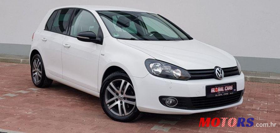 2012' Volkswagen Golf VI 1,6 Tdi photo #1