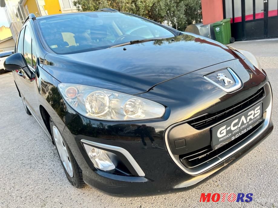 2012' Peugeot 308 Sw photo #1