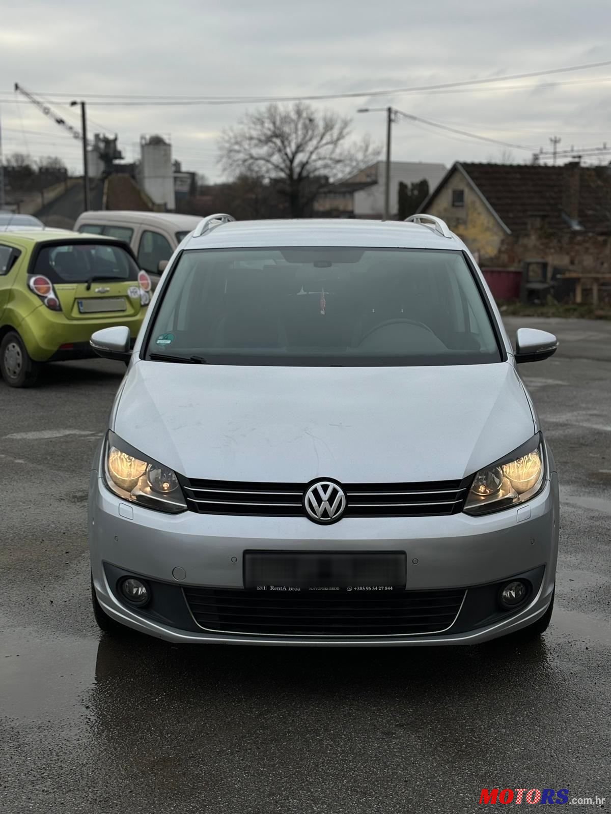 2013' Volkswagen Touran 1,6 Tdi photo #1