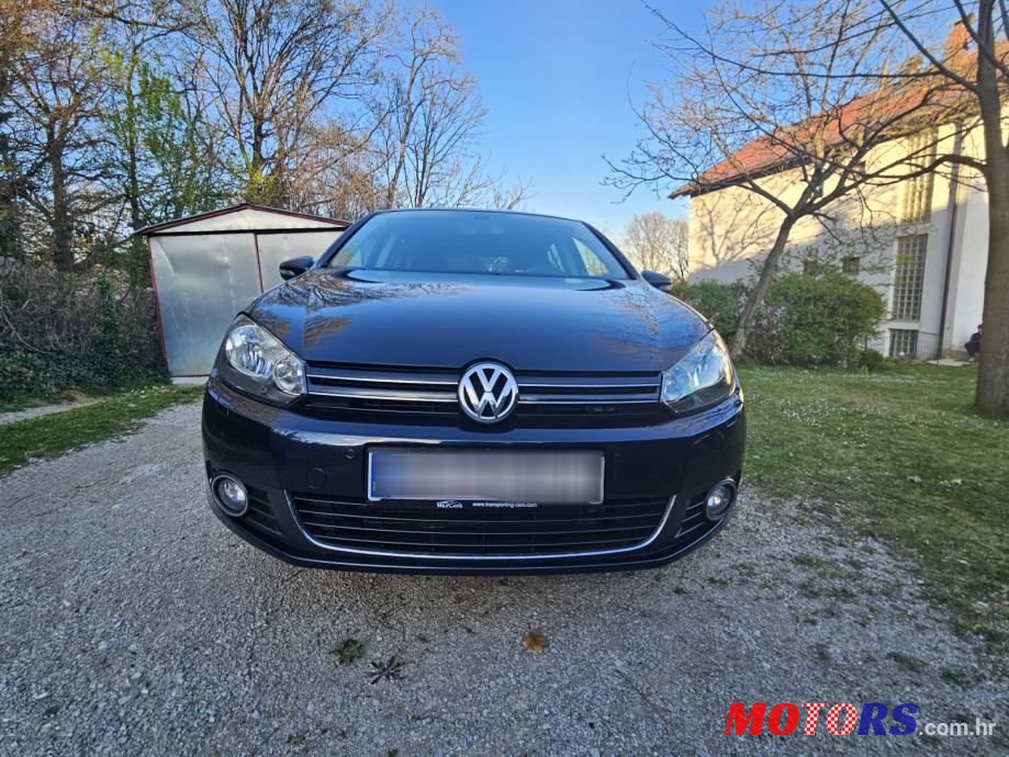 2012' Volkswagen Golf VI 1,6 Tdi photo #1