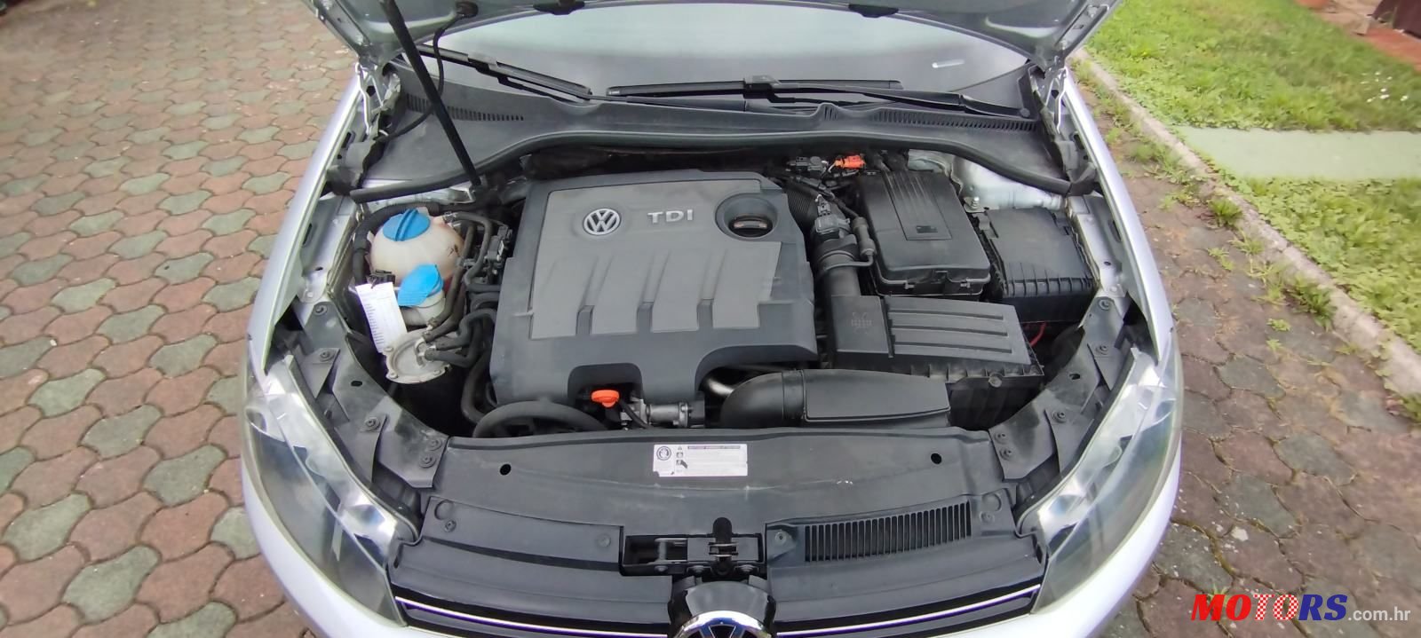2012' Volkswagen Golf VI Variant photo #6