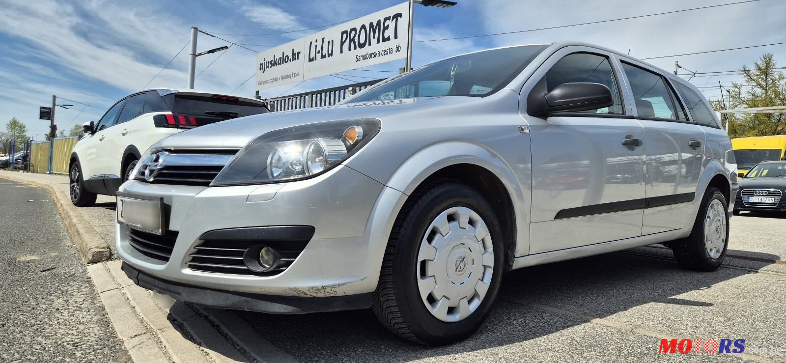 2006' Opel Astra Karavan photo #1