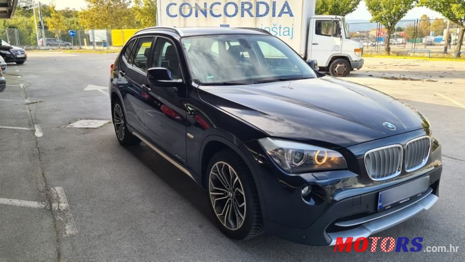 2011' BMW X1 Xdrive23D photo #2