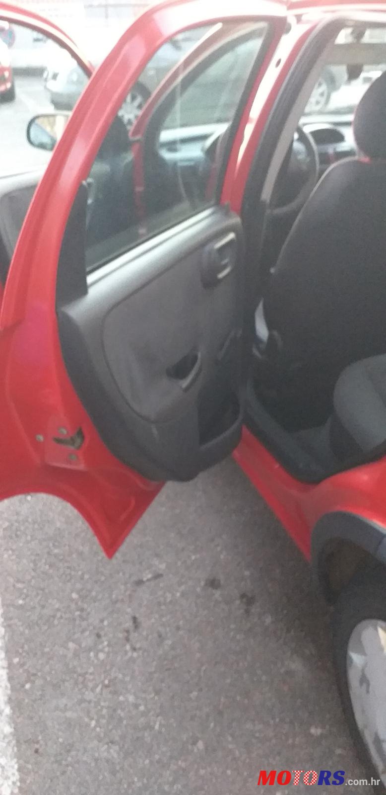 2004' Opel Corsa photo #4