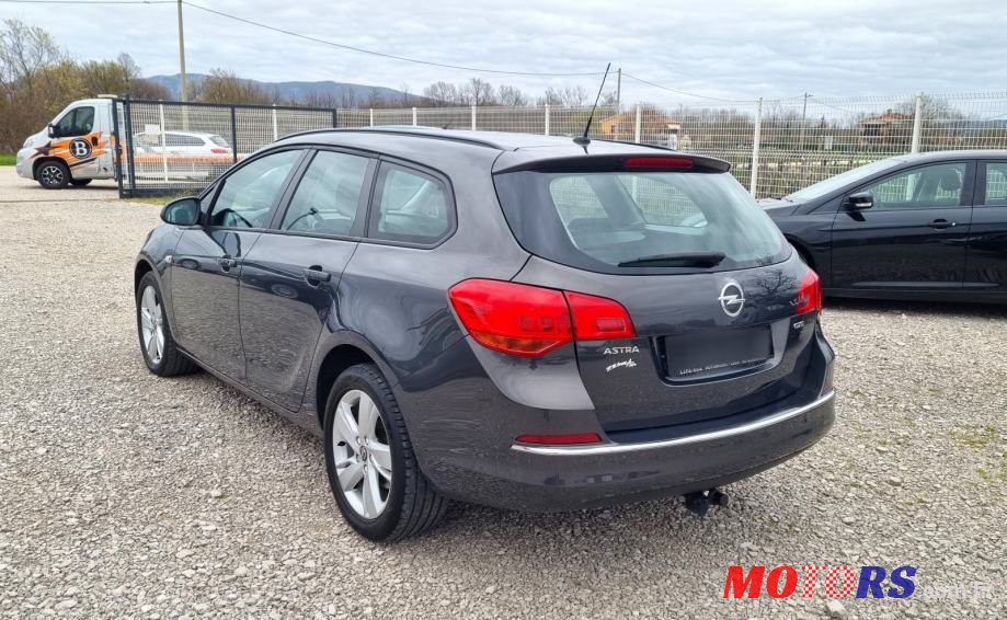 2014' Opel Astra Karavan photo #3