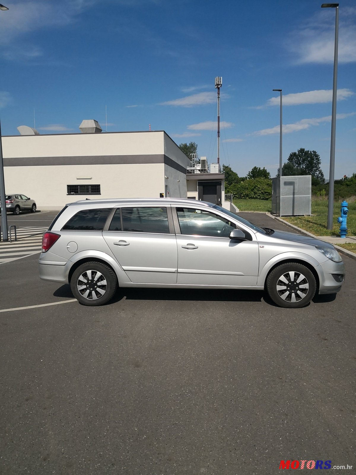 2009' Opel Astra H A-H SW photo #1