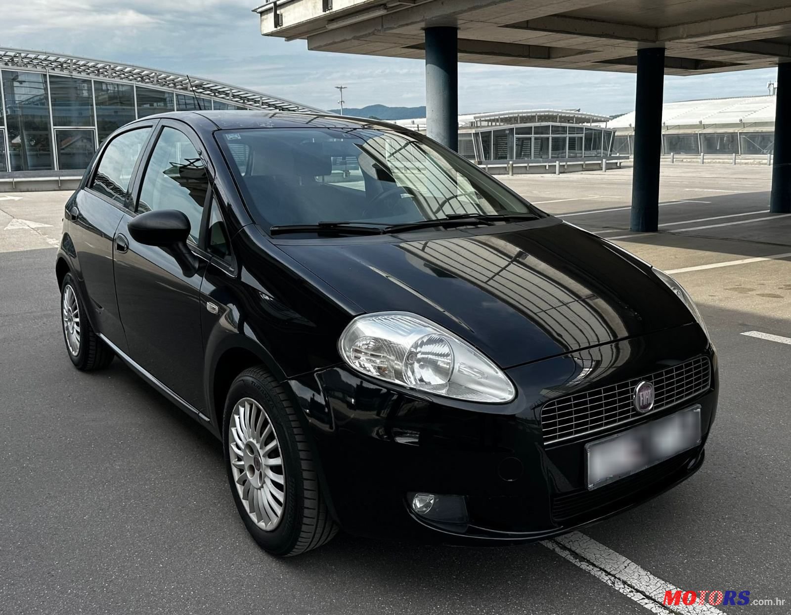 2008' Fiat Grande Punto 1,4 photo #1