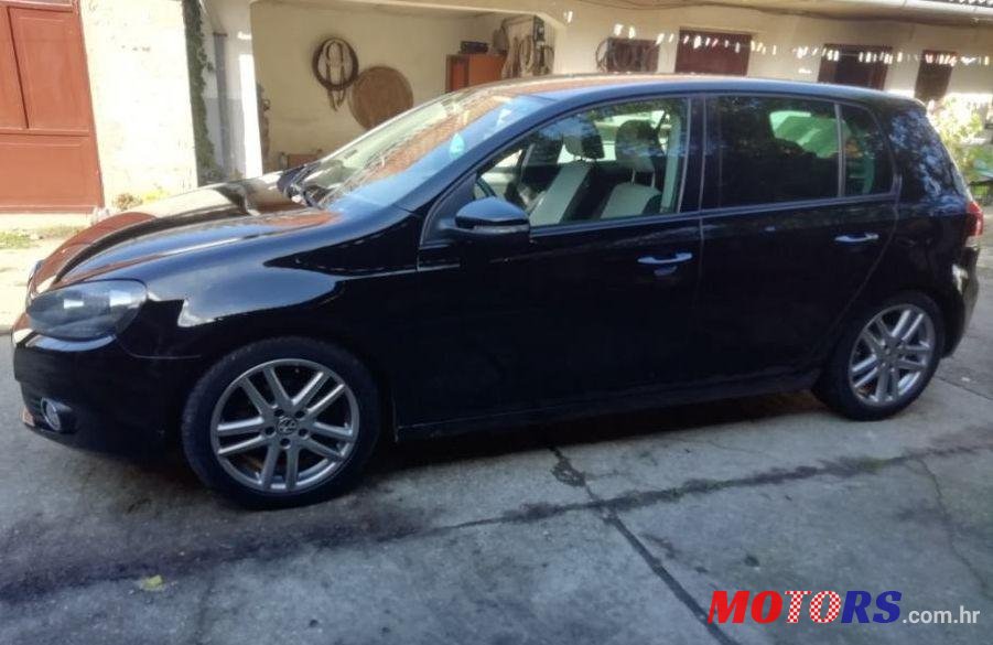 2009' Volkswagen Golf VI 1,6 Tdi photo #1