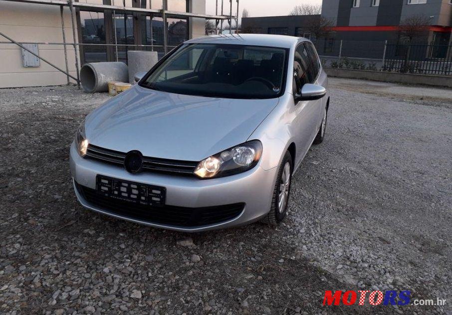 2011' Volkswagen Golf VI 1,6 Tdi photo #1