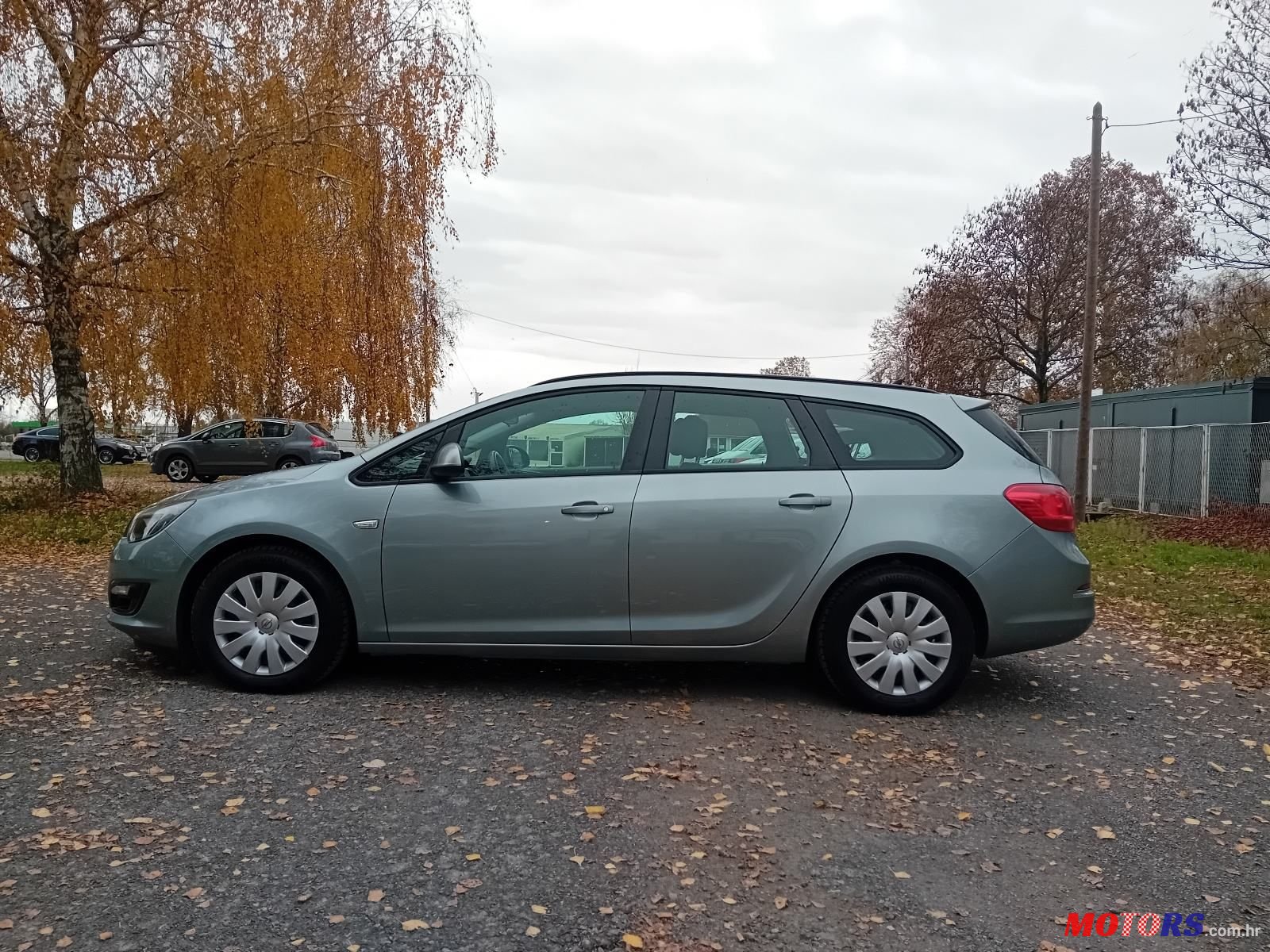 2014' Opel Astra Karavan photo #3