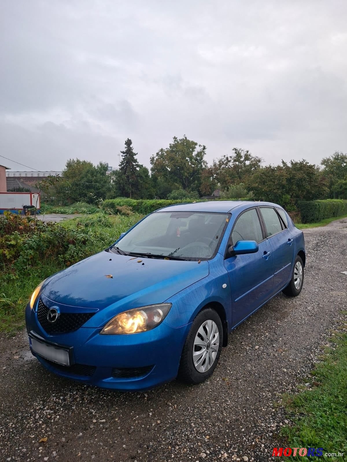 2004' Mazda 3 Sport 1,4 I Ce photo #2