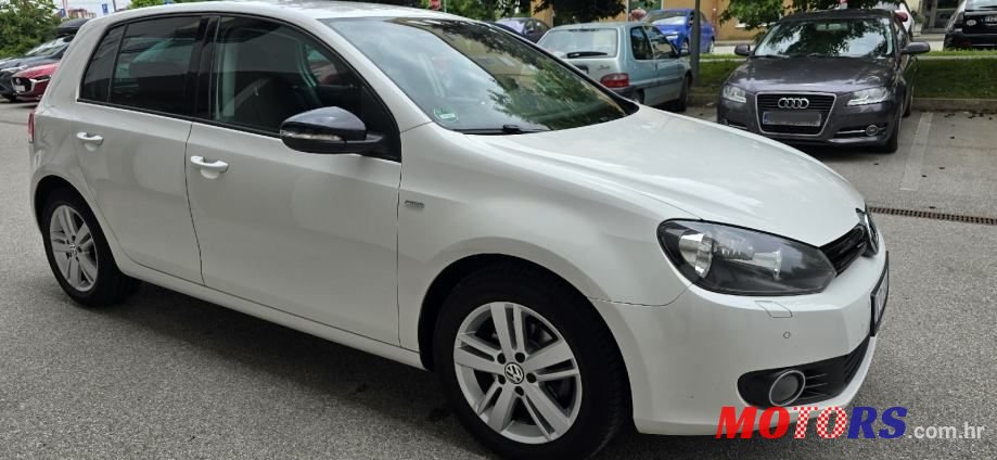 2012' Volkswagen Golf VI 1,6 Tdi photo #2