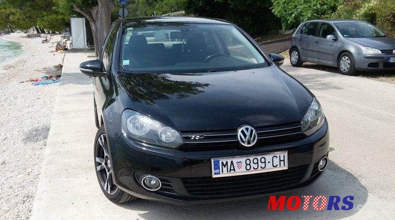 2011' Volkswagen Golf VI 1,6 Tdi photo #1