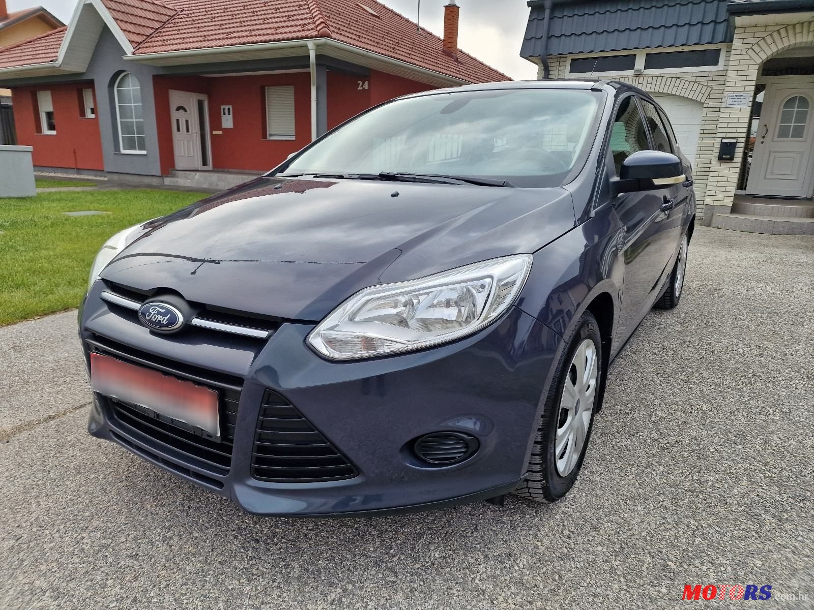 2013' Ford Focus 1,6 photo #1