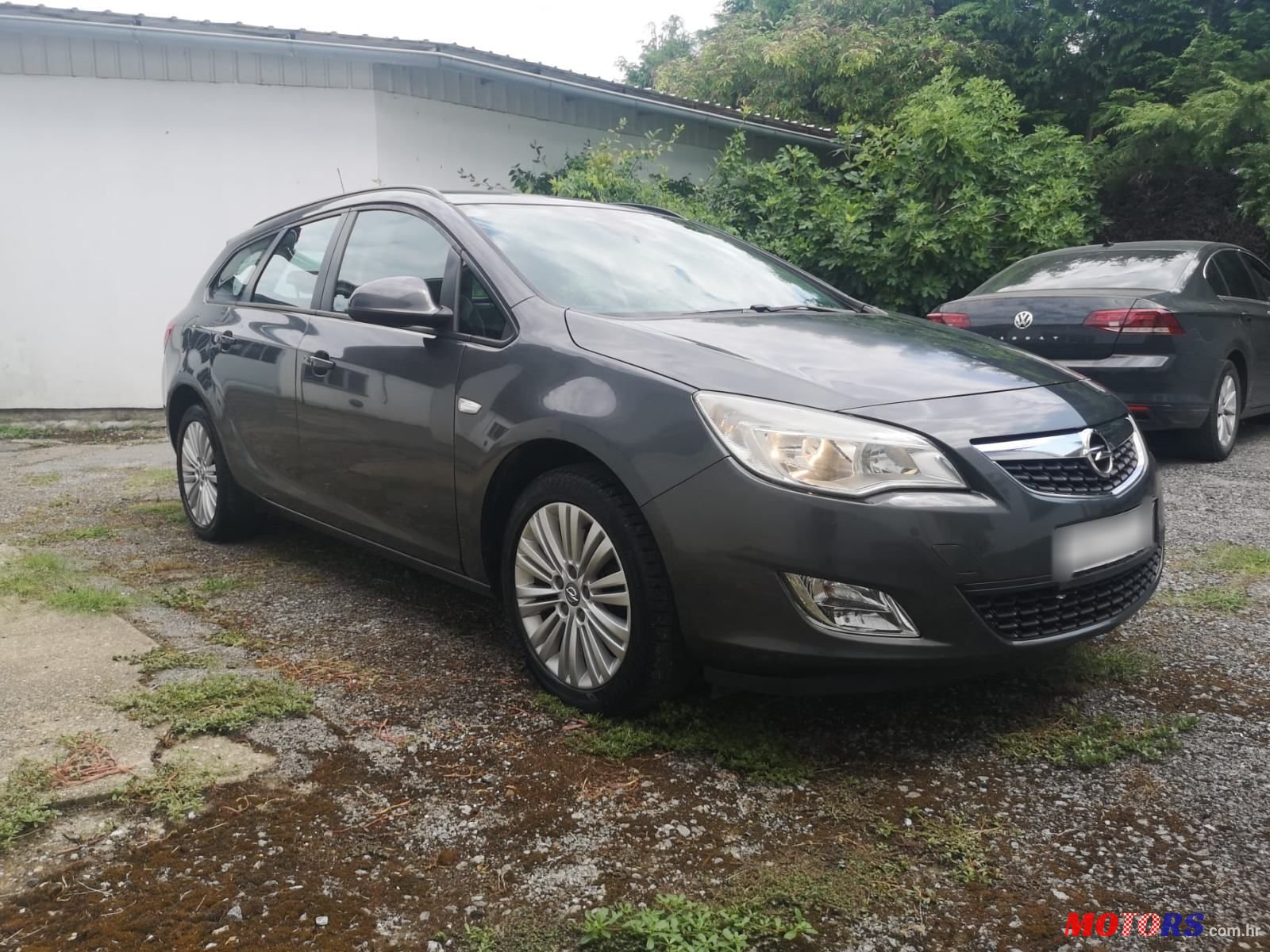 2012' Opel Astra Karavan photo #4