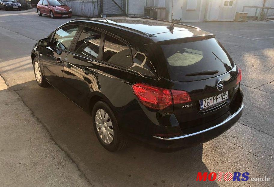 2014' Opel Astra Karavan 1,6 Cdti photo #2